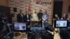 Ethnic Serb politician Igor Simic speaks to reporters on May 19. 