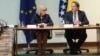 Oliver Varhelyi, the European Commissioner for Neighborhood and Enlargement (right), and Borjana Kristo, chairman of the Bosnian Council of Ministers.