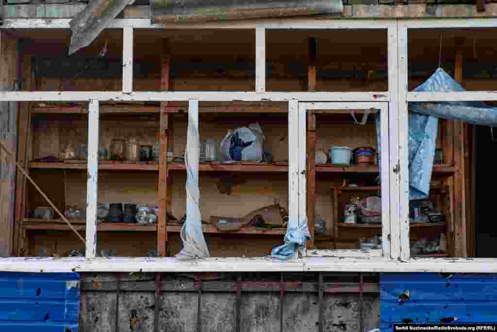 Remnants of a peaceful life seen through windows blown out by explosions. The photos in this gallery were made in late September and published on October 12. The Ukrainian military often requires lengthy embargoes before images from military positions can be published.