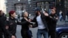 Armenian police arrest protesters trying to block the streets of Yerevan on May 13. 