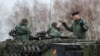 Polish instructors and Ukrainian soldiers train on Leopard 2 A4 tanks in Swietoszow, Poland, on February 13.
