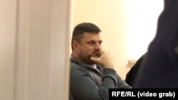 Andriy Naumov attends a hearing before the High Court in Nis on April 6.