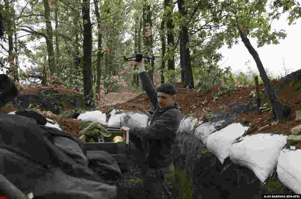 A Ukrainian drone operator near the front prepares a drone for flight. Drones can operate in high-risk environments and carry out missions that would be too dangerous or difficult for ground forces or manned aircraft. Additionally, advances in sensors and high-resolution cameras allow drones to operate at night. Their ability to fly in rain, snow, and foggy conditions is still a problem, however. 