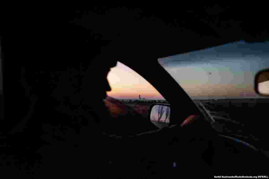 The towers of the Vuhledar coal mine seen during the drive to the besieged town. Driving in the gloom before sunrise minimizes the risk of being targeted by Russian kamikaze drones. Bomb-dropping quadcopters are also used on these eastern roads to target military equipment and sometimes even cars.