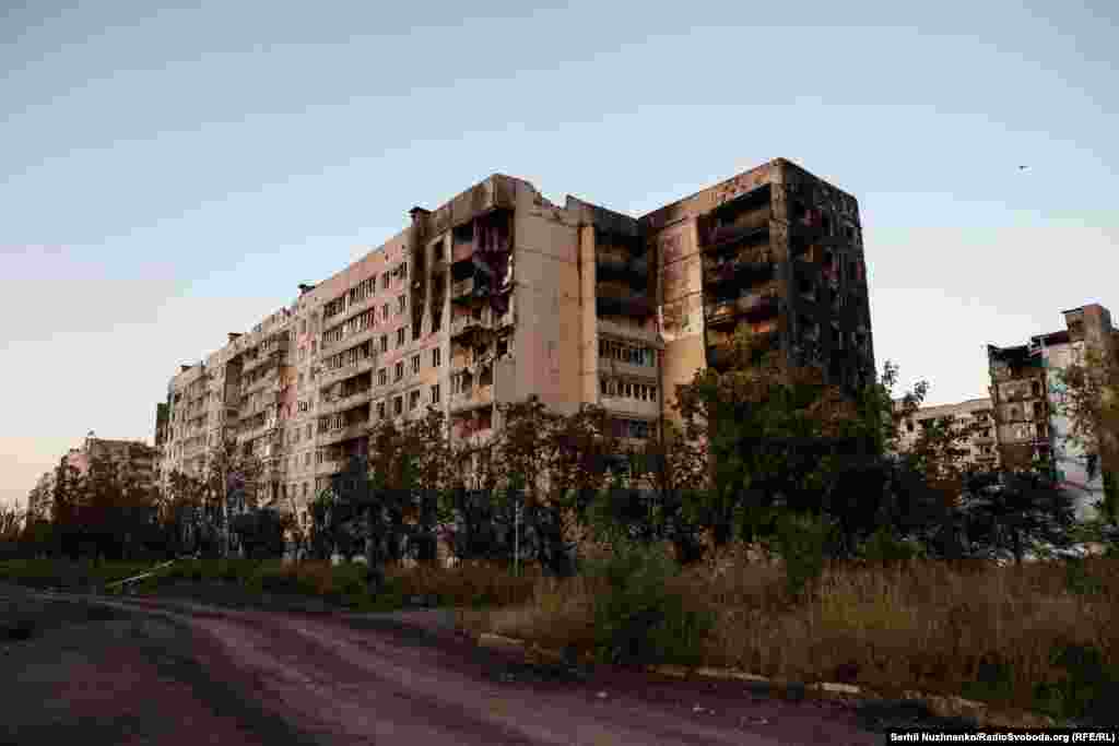 Almost no undamaged buildings remain in the town, which is shelled several times each day by the Russian military.