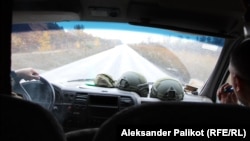 Serhiy Skoryk and Eduard Lakyonov speed along roads in the Kherson region.