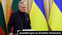 Lithuanian President Gitanas Nauseda said equally strict restrictions must be imposed on both countries in response to Moscow's ongoing war against Ukraine, but was overruled. (file photo)