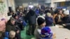 Bakhmut residents gather at one of the volunteer-run "Points of Invincibility" to get a warm meal, recharge their phones, and share a sense of community as Russian forces continue to pummel the city in Ukraine's Donetsk region. 