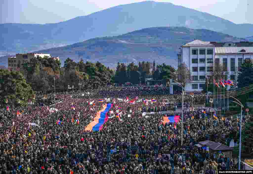 With the blockade threatening food, medicine, and fuel supplies to Nagorno-Karabakh's 120,000 people, thousands of Armenians took to the streets in Stepanakert on December 25 to protest against Azerbaijan.