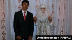 Newly married Anvar and Nargiz after their traditional wedding. The Tajik government is wary of a revival of Muslim customs, fearing the rise of radical Islam and the return of young people who went to fight in Syria.