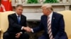 Romanin President Klaus Iohannis (left) and U.S. President Donald Trump at the White House on August 20.