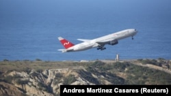Վենեսուելա - Ռուսական Nordwind ավիաընկերության Boeing 777-200ER օդանավը թռիչք է կատարում Կարակասի օդանավակայանից, 30-ը հունվարի, 2019թ․