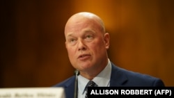 Matthew Whitaker. Fotografi nga arkivi.