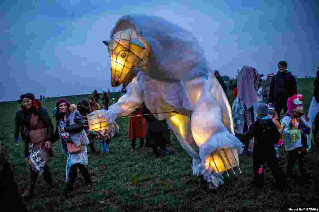 CZECH REPUBLIC -- Locals wear costumes in a parade for Masopust, the Czech celebration of Carnival or Mardi Gras, Roztoky u Prahy, February 10, 2018
