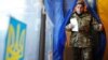 Під час голосування на одній з виборчих дільниць на Львівщині (архівне фото)