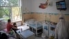 COVID-19: Uzbek Medics Accuse Government Of Breaking Promises; Romanians Now Stopped From Leaving Hospital