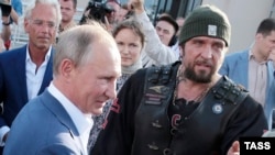 Владимир Путин и Александр "Хирург" Залдостанов