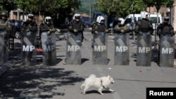 Polish KFOR members guard a municipal office in Zvecan in northern Kosovo on May 30. 