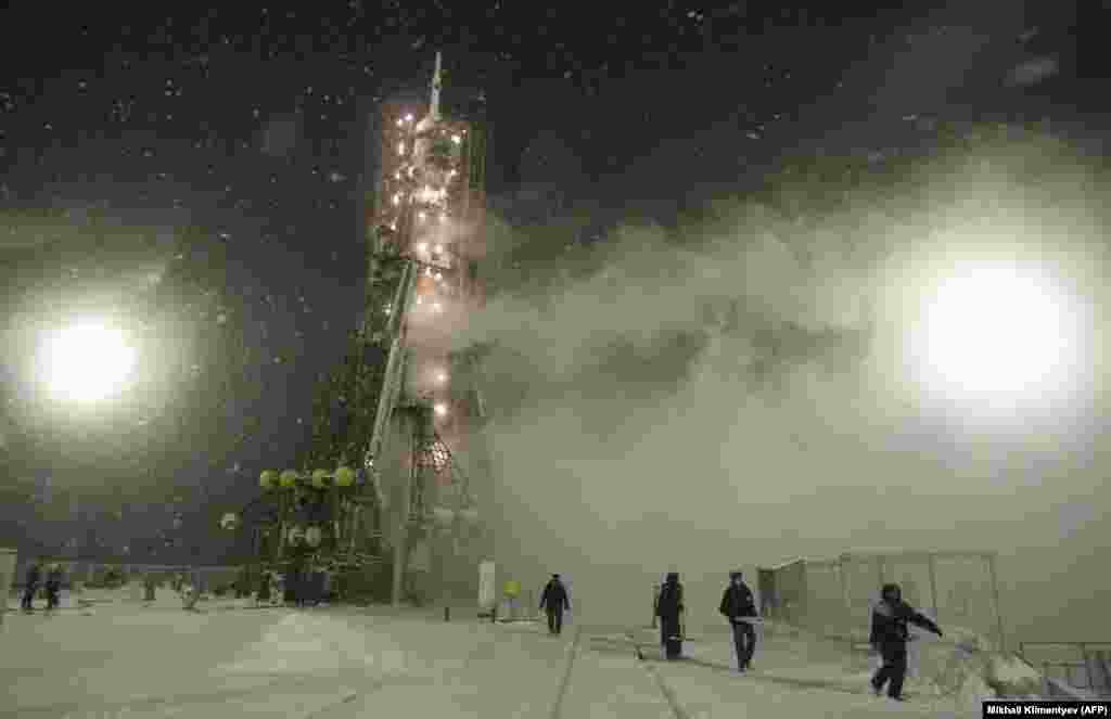 A Soyuz rocket that would take U.S. astronaut Dan Burbank to the International Space Station (ISS) readies for launch on a freezing morning in November 2011. Since the U.S. Space Shuttle program ended in 2011, the United States has paid Russia tens of millions of dollars per astronaut for rides to the ISS. &nbsp;