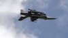 A Pakistani F-16 fighter performs a flypast during the Pakistan Day military parade in Islamabad on March 23.