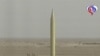 An image grab from the Arabic-language Iranian TV station Al-Alam shows a Shahab-3 missile being fired