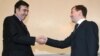 Georgia's Mikheil Saakashvili (left) meets Russian President Dmitry Medvedev in St. Petersburg in June