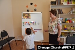 A boy who was evacuated from Syria takes part in a lesson in a rehabilitation center in Aqtobe in northwestern Kazakhstan. (file photo)