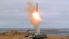 An August 18 photo provided by the U.S. Defense Department shows the launch of a conventionally configured ground-launched cruise missile on San Nicolas Island off the coast of California. 