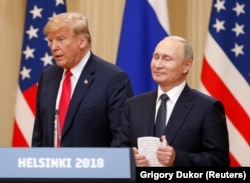Президент США Дональд Трамп и президент России Владимир Путин прибыли на совместную пресс-конференцию после встречи в Хельсинки. 16 июля 2018 года.