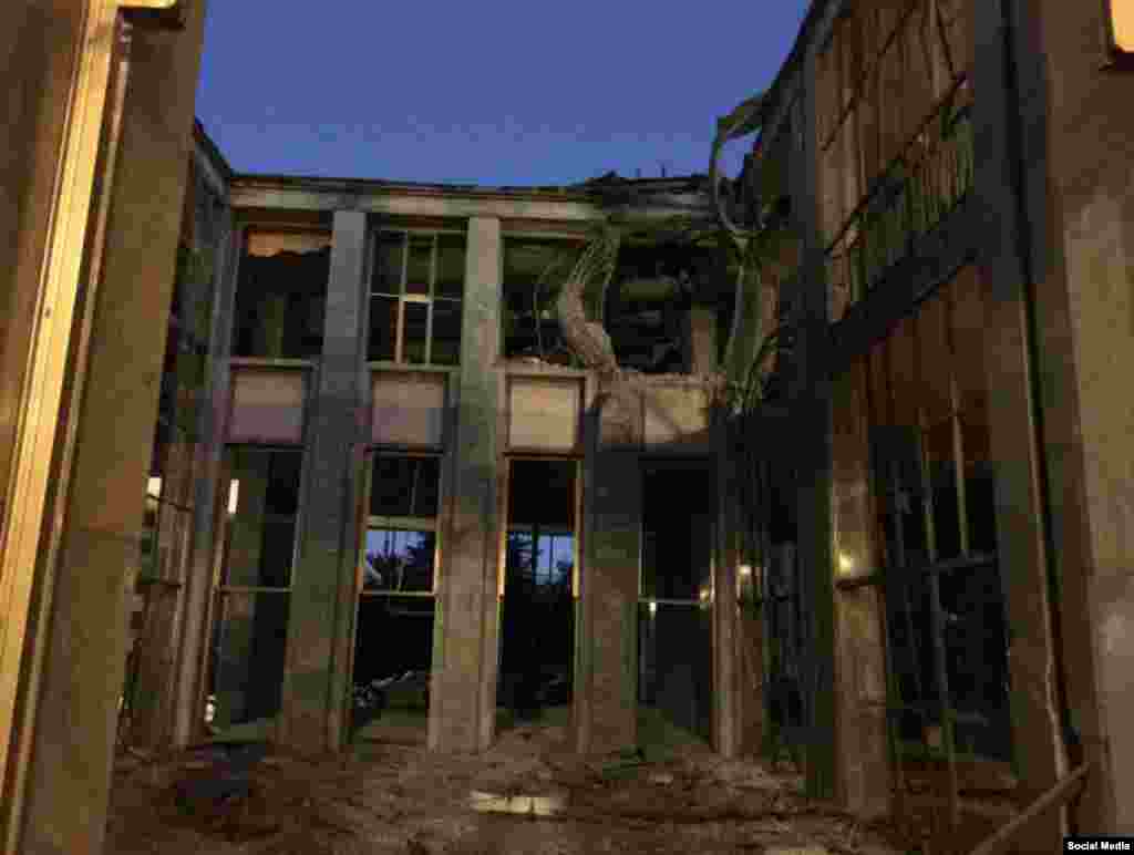 Around 10 p.m. on July 15, tanks surrounded the Turkish parliament building in Ankara. Explosions were reported. This image, from the Twitter account of Turkish politician Ömer Çelik, shows apparent damage to the building.