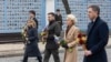 Left to right: Canadian Prime Minister Justin Trudeau, Italian Prime Minister Giorgia Meloni, Ukrainian President Volodymyr Zelenskiy, EU Commission President Ursula von der Leyen, and Belgian Prime Minister Alexander De Croo attend a ceremony at the Wall of Remembrance in Kyiv on February 24. 