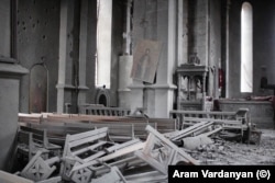 The interior of the 19th-century Holy Savior Cathedral, also known as the Ghazanchetsots Cathedral, after being hit by several artillery rounds
