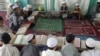 Afghan boys read the Koran at a madrasah in Ghazni Province. President Ghani has stressed that the Koran and Islamic Shari’a law should be the basis of the ongoing peace talks between the government and the Taliban. (file photo)