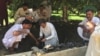 The life-sized statue was smashed with a sledgehammer in the northwestern town of Takhbhai. 