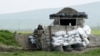 Nagorno-Karabakh -- An ethnic Armenian soldier stands guard at the checkpoint near Nagorno-Karabakh's town of Martuni, April 8, 2016