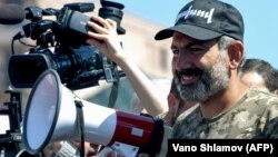 Opposition leader Nikol Pashinian addresses supporters during a rally in central Yerevan on April 25.