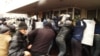Pro-Russia protesters storm the mayor's office in Mariupol on April 13.