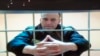 Russian opposition leader Aleksei Navalny appears via video link at a hearing in a Moscow court in May 2022.
