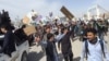 Defaced Dostum Billboards Nearly Ruin New Year's In Mazar-e Sharif