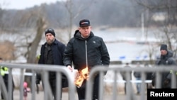 Стокгольмера Палудан Расмусан акци