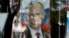 Портрет президента России Владимира Путина в витрине книжного магазина в оккупированном Симферополе (иллюстрационное изображение)