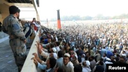 A stampede that killed 15 people broke out in the Afghan city of Jalalabad in October as thousands gathered to collect Pakistani visas. 