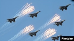 Armenia - Russian MiG-29 fighter jets take part in an Armenian military parade in Yerevan, 21Sep2016.