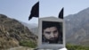 A picture of Ahmad Shah Masud along a roadside in Afghanistan