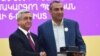 Armenia - President Serzh Sarkisian awards a state medal to businessman Samvel Aleksanian (R) in Yerevan, 26 September 2015.