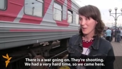 Families Fleeing Luhansk Fighting Arrive In Lviv