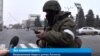 Masked, Gun-Toting Troops Hit Streets Of Ukraine's Separatist-Held Luhansk