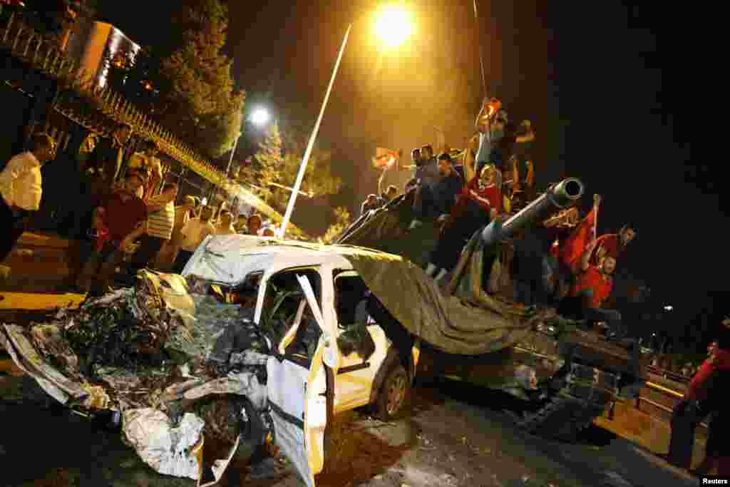 Civilians surround a Turkish Army tank in Ankara. 