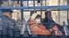 COVID-19: Kazakhstan Locks Down Two Main Cities; Iran Warns Virus Could Kill 'Millions'