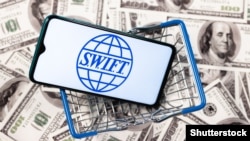 Western powers agreed to block access to the SWIFT banking system for "selected" Russian banks in a major step up in sanctions against Moscow.